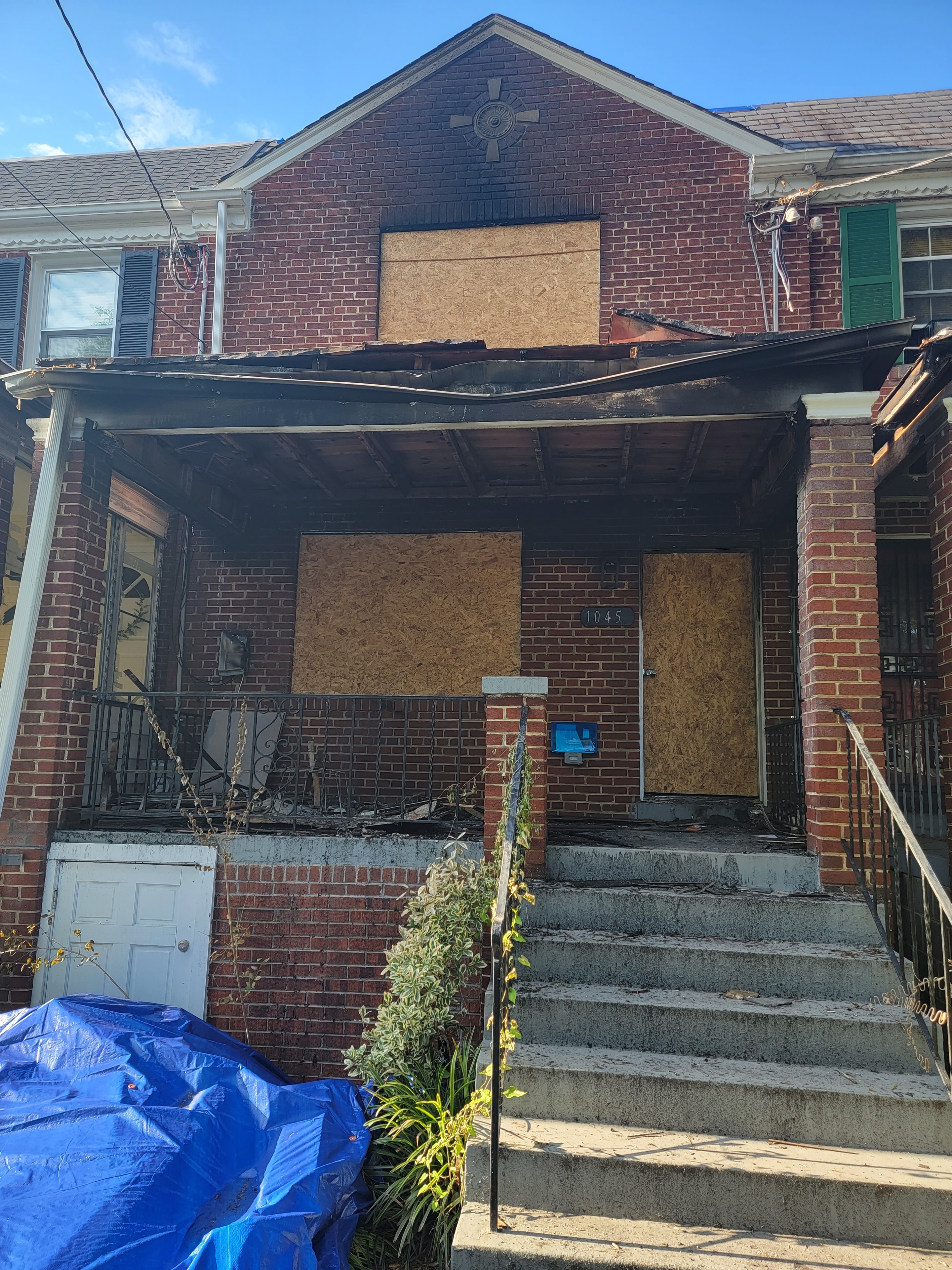 Before photo showing structural fire damage in a Northeast Washington, DC home